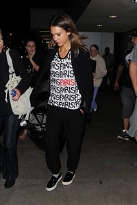 Jessica Alba arriving at LAX August 05, 2014