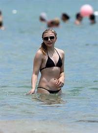 Chloe Grace Moretz candids in a Black Bikini in Miami Beach