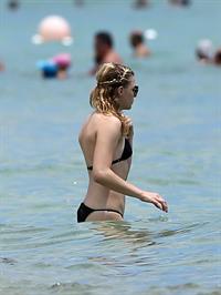 Chloe Grace Moretz candids in a Black Bikini in Miami Beach