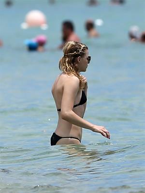 Chloe Grace Moretz candids in a Black Bikini in Miami Beach