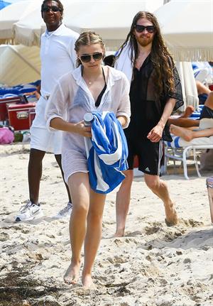 Chloe Grace Moretz candids in a Black Bikini in Miami Beach
