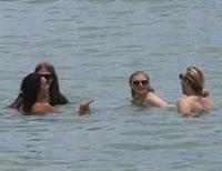 Chloe Grace Moretz candids in a Black Bikini in Miami Beach