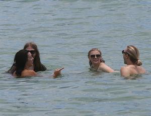 Chloe Grace Moretz candids in a Black Bikini in Miami Beach