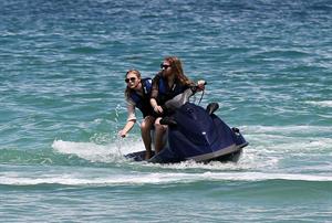 Chloe Grace Moretz candids in a Black Bikini in Miami Beach