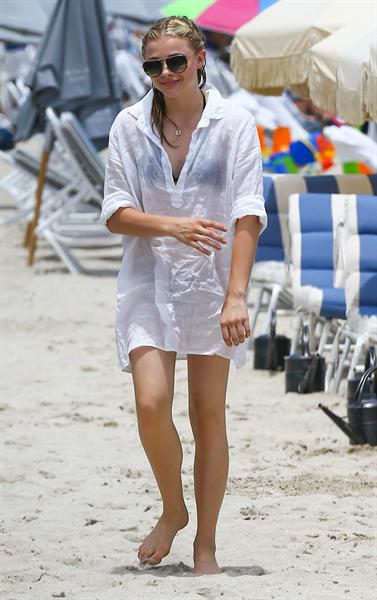 Chloe Grace Moretz candids in a Black Bikini in Miami Beach