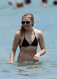 Chloe Grace Moretz candids in a Black Bikini in Miami Beach