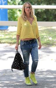 Heidi Klum out for lunch in Brentwood in a yellow shirt