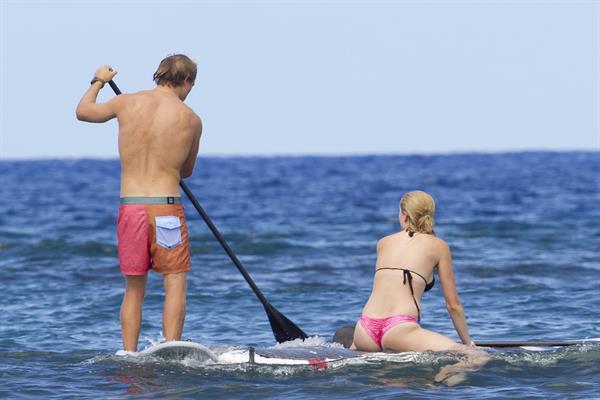 Ireland Baldwin goes paddle-boarding in Hawaii with her boyfriend Slater Trout May 26, 2013 