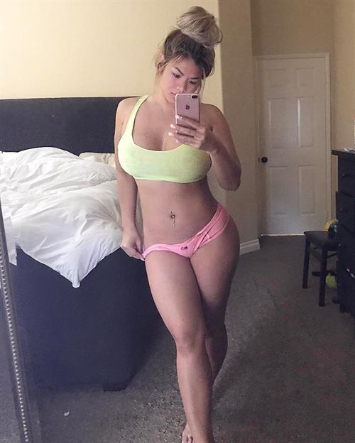 Jojo Babie in a bikini taking a selfie