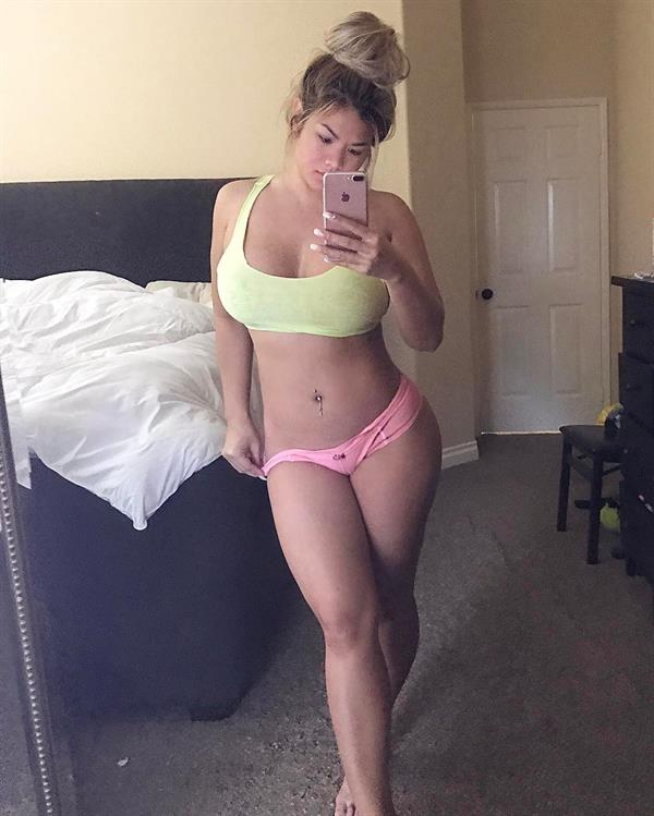 Jojo Babie in a bikini taking a selfie