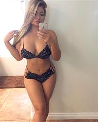 Jojo Babie in lingerie taking a selfie