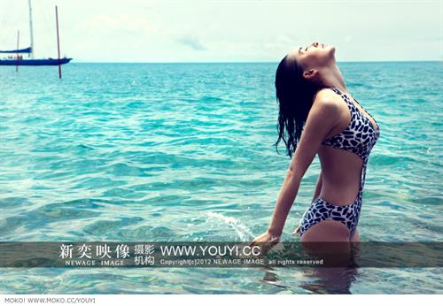 Monica Mok in a bikini