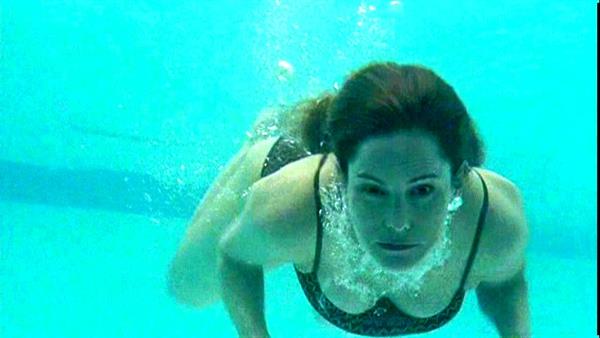 Jennifer Jason Leigh in a bikini