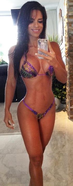 Michelle Lewin in a bikini taking a selfie