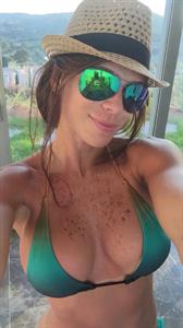 Michelle Lewin in a bikini taking a selfie