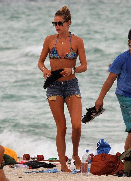 Doutzen Kroes bikini candids on the beach in Miami, Florida Augusts 15, 2012
