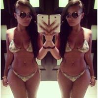 Heather Jayne Elrick-Tobin in a bikini taking a selfie