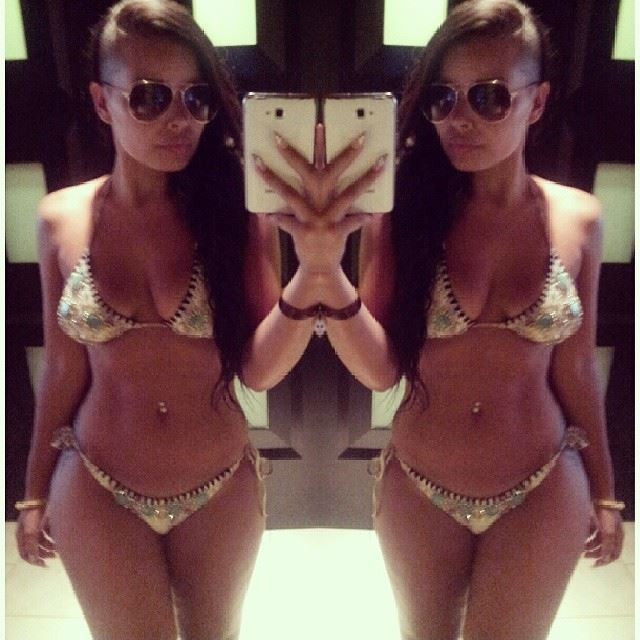 Heather Jayne Elrick-Tobin in a bikini taking a selfie