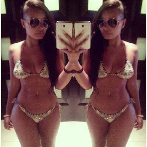 Heather Jayne Elrick-Tobin in a bikini taking a selfie