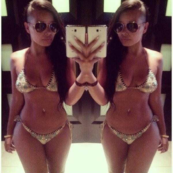 Heather Jayne Elrick-Tobin in a bikini taking a selfie