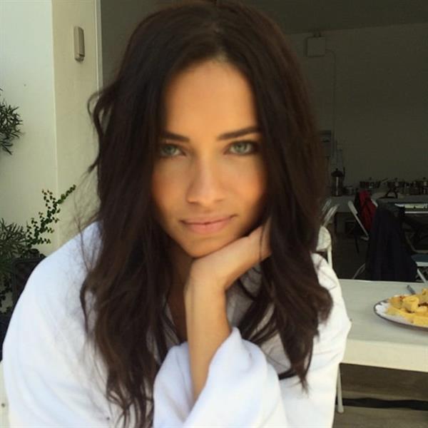 Adriana Lima taking a selfie