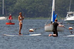 Taylor Swift paddleboarding in Westerly, Massachusetts 7/28/13 
