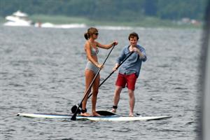 Taylor Swift paddleboarding in Westerly, Massachusetts 7/28/13 