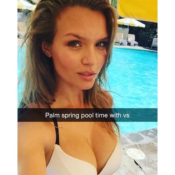 Josephine Skriver in a bikini taking a selfie