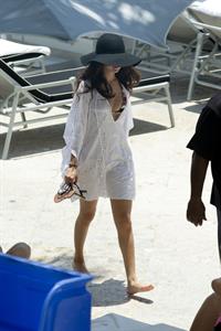 Selena Gomez in bikini by a hotel pool in Miami 5/11/13 
