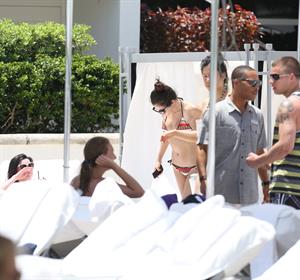 Selena Gomez in bikini by a hotel pool in Miami 5/11/13 