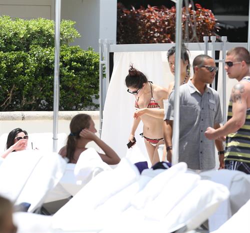 Selena Gomez in bikini by a hotel pool in Miami 5/11/13 