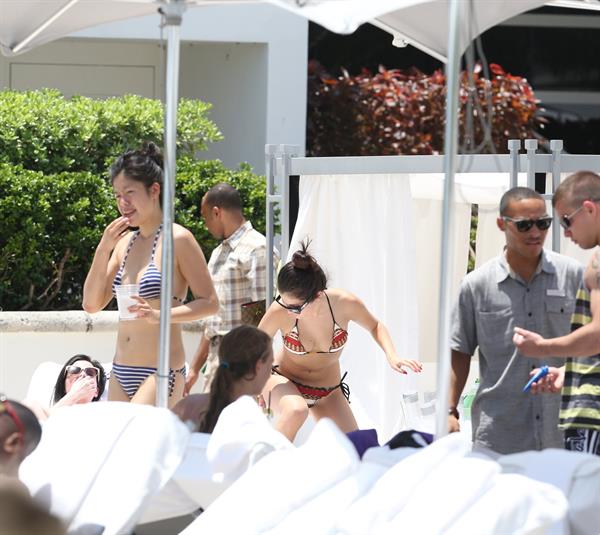 Selena Gomez in bikini by a hotel pool in Miami 5/11/13 