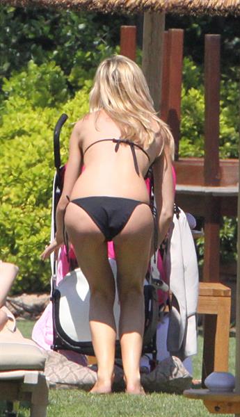 Abigail Clancy bikini candids in Italy on June 10, 2011 