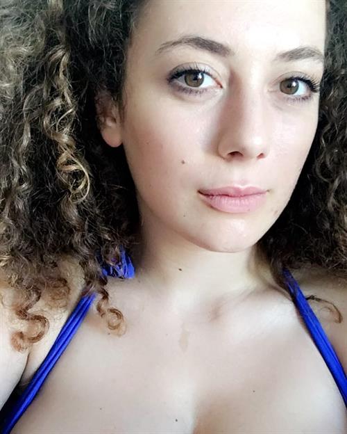 Leila Lowfire in a bikini taking a selfie