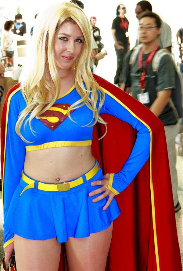 Girls dressed up as Supergirl