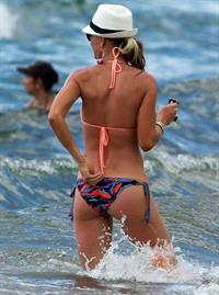 Suzanne Quast in a bikini - ass