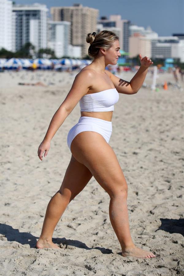 Iskra Lawrence in a swimsuit on Miami beach doing a photoshoot for Aerie on 11/26/2018