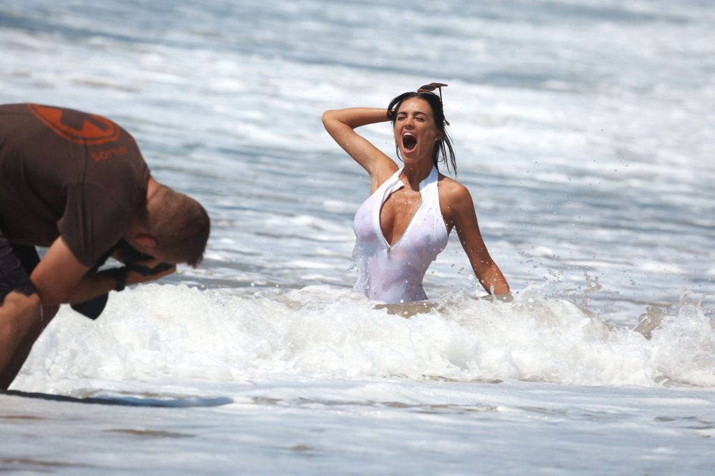 Charlie Riina in a beach photoshoot for 128 Water in Santa Monica on  11/25/2018