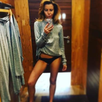 Stacey Dooley in lingerie taking a selfie