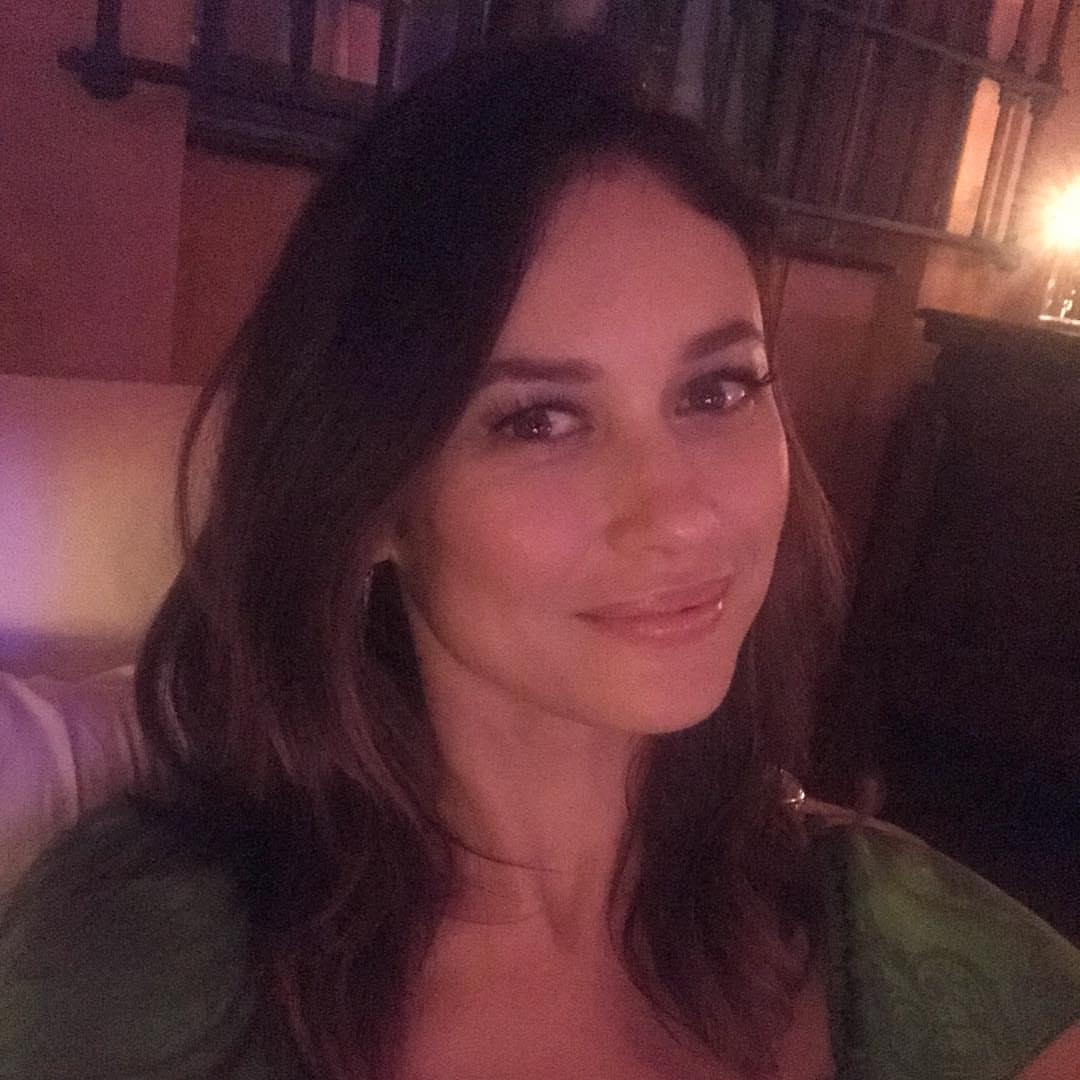 Olga Kurylenko taking a selfie