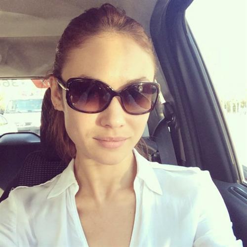 Olga Kurylenko taking a selfie