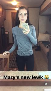 Adelaide Kane taking a selfie