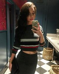 Adelaide Kane taking a selfie