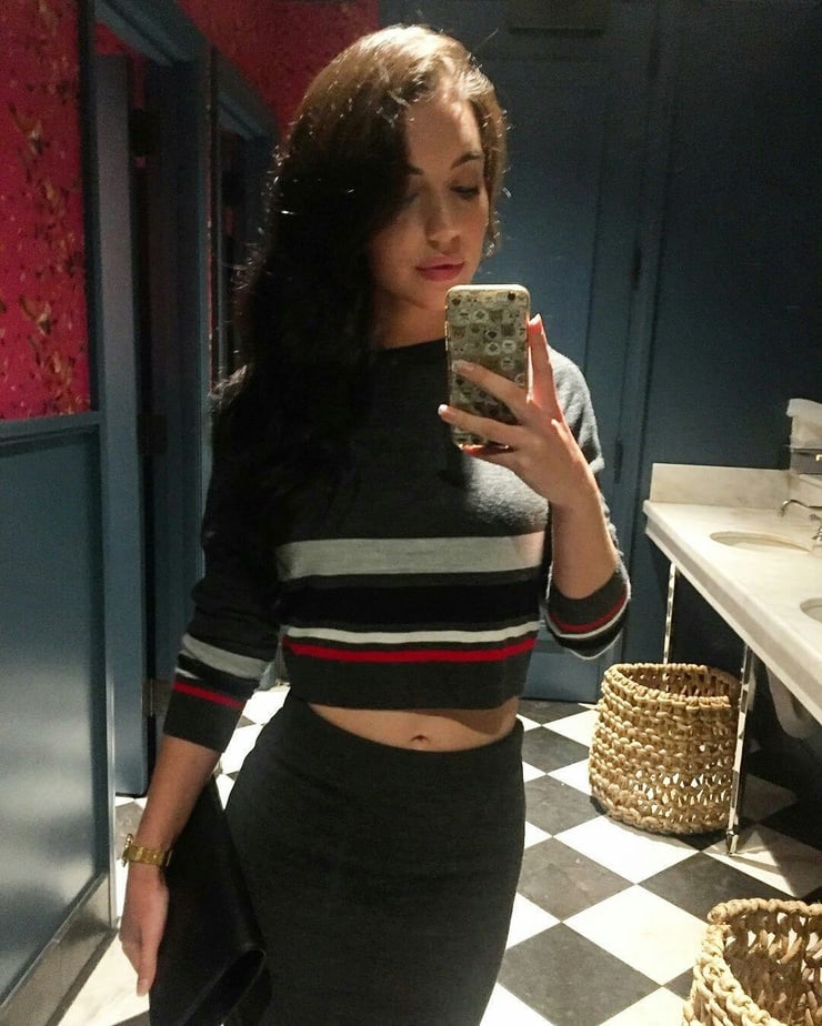 Adelaide Kane taking a selfie