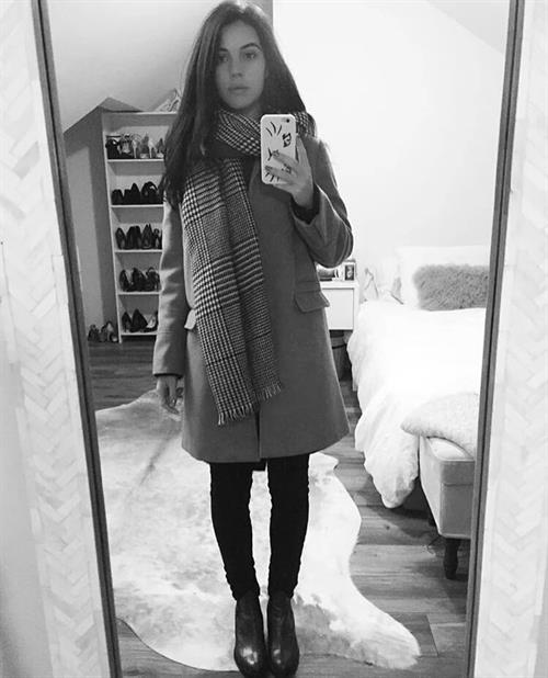 Adelaide Kane taking a selfie