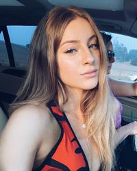 Daisy Keech taking a selfie