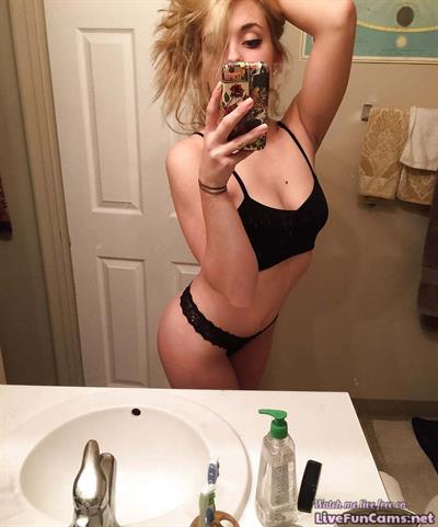 Anonymous in a bikini in lingerie taking a selfie