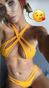 Sara Jean Underwood in a bikini taking a selfie