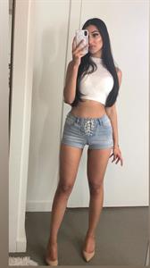 Komal Basran taking a selfie