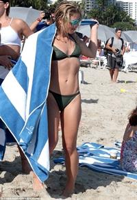 Emily Bett Rickards in a bikini